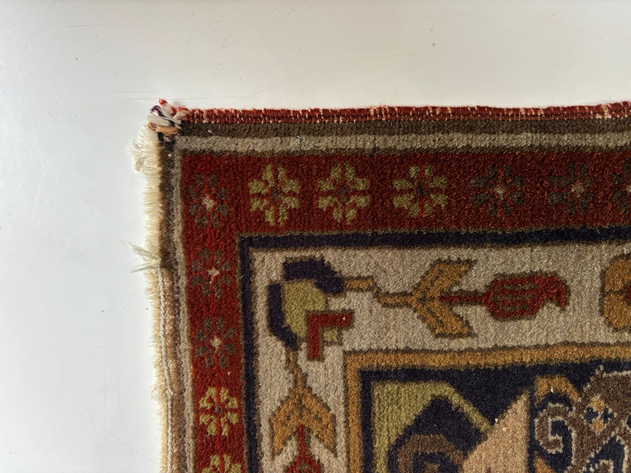 Tapis lavé et restauré en atelier